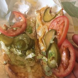 Subway - Tuna, lettuce (I guess we are still giving the bare minimum), tomato, and "extra" pickles