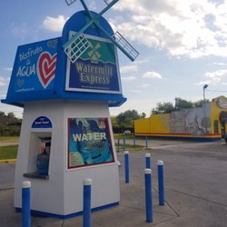 Watermill Express - Water dispenser. 2 spouts. 25 cents per gallon.  No ice here, but you can buy some at the convenience store next door.