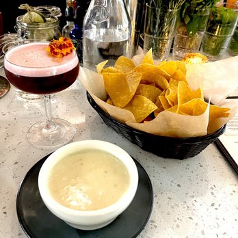 La Semilla - Chips/queso and pisco cocktail - Latin American Near Me - Atlanta, Georgia