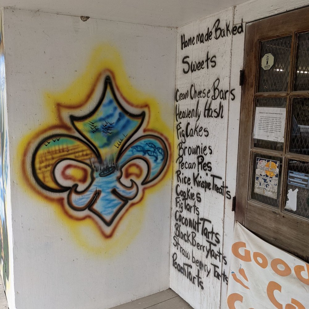 Suire's Grocery and Restaurant - graffiti on the wall - Cajun/Creole Near Me - Kaplan, Louisiana Suire's Grocery and Restaurant - graffiti on the wall - Cajun/Creole Near Me - Kaplan, Louisiana