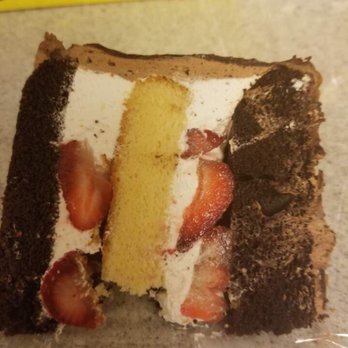 La Promenade - Chocolate and vanilla layers with whipped cream and strawberries and ganache on top! - Bakeries Near Me - Tenafly, New Jersey La Promenade - Chocolate and vanilla layers with whipped cream and strawberries and ganache on top! - Bakeries Near Me - Tenafly, New Jersey
