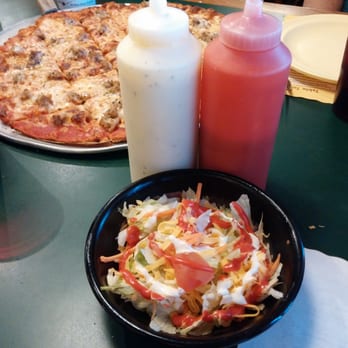 Monical's Pizza - Salad! The red (french) dressing is renowned.... Try it!  Also try mixing red and white (ranch).  Can't get enough! - Pizza Near Me - Bourbonnais, Illinois