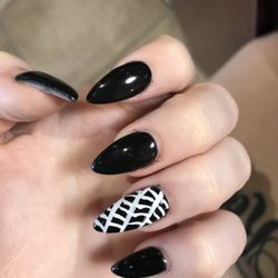 The Next Generation Hair and Nail - Asked for siletto and cob webs, got this garbage. They didn't even fill my nails in fully, no point, also peep the thickness of that thumb.