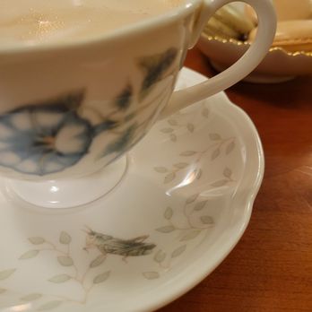 Cafe Giverny - Beautiful serveware with lovely details like this grasshopper. A little bee emerged as I sipped my caffe latte too! - Desserts Near Me - Los Angeles, California