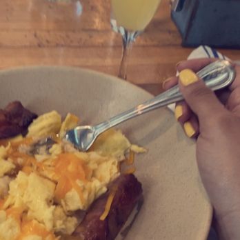 Ava - Ordered: Breakfast Bowl  Contains: Home Fries OR Grits, eggs your way, 2 bacon, 1 sausage, cheddar cheese - Italian Near Me - Tampa, Florida