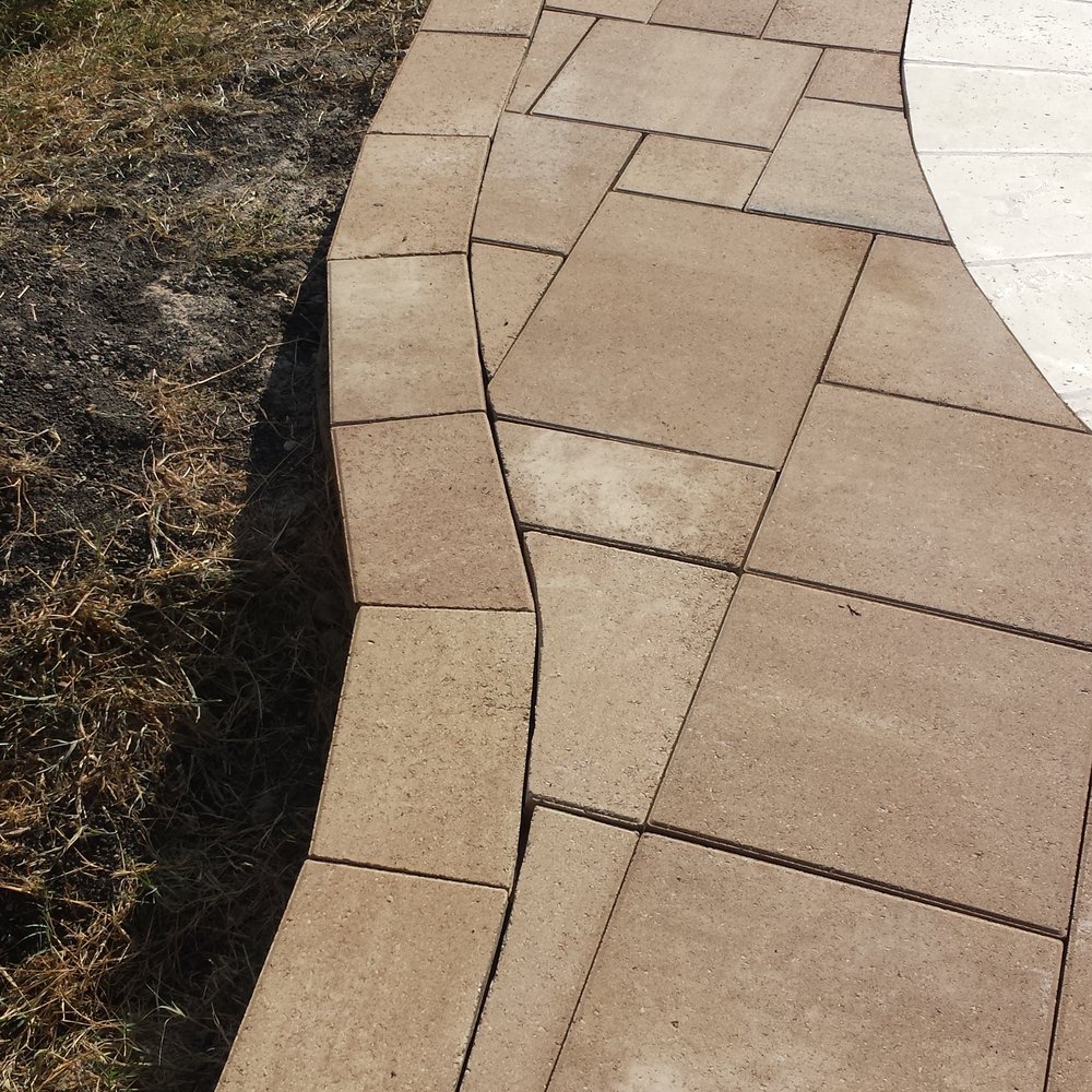 Precision Pavers - Same size stones laid in one line with no overlap, and is like this all over the place. - General Contractors Near Me - Plano, Texas Precision Pavers - Same size stones laid in one line with no overlap, and is like this all over the place. - General Contractors Near Me - Plano, Texas