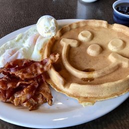 a waffle, bacon, and eggs a waffle, bacon, and eggs