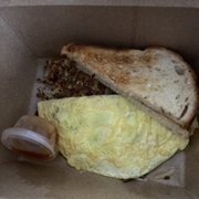 Photo of Estero Cafe - Valley Ford, CA, United States. Sonoma omelette with toast and hash browns.