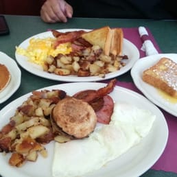 Grand Slam and side of french toast and pancakes! Grand Slam and side of french toast and pancakes!