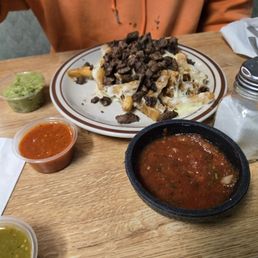 Half order of carne asada fries w/ sauces on the side
