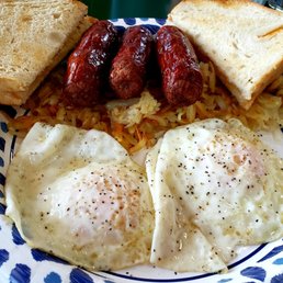 Perfectly executed fried eggs...THEE best sausages and hashbrowns.... with yummy sour dough toast! Omgoodness!!