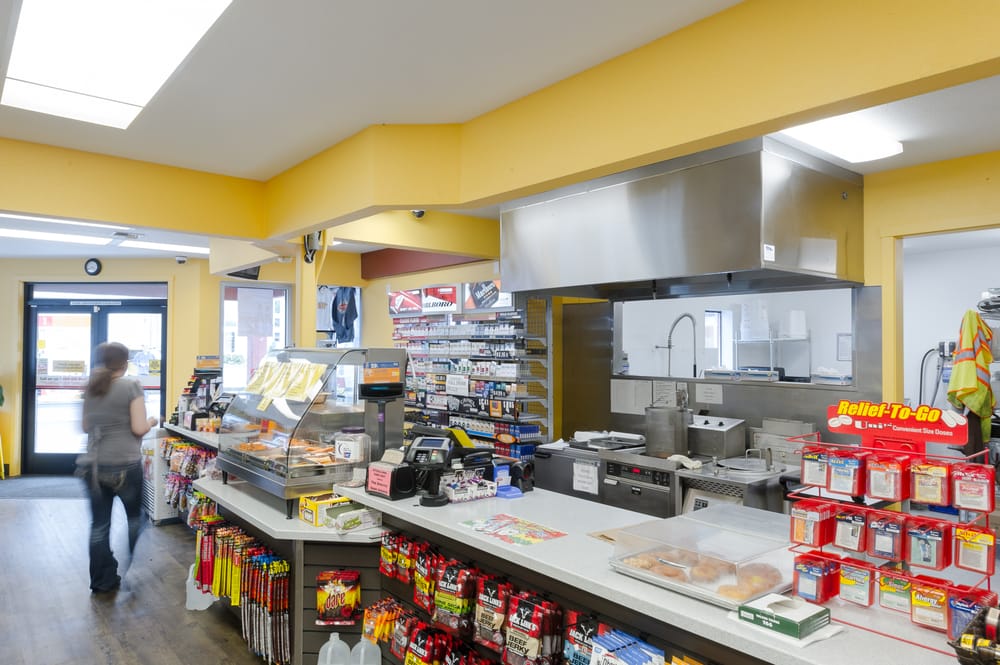 Astoria Mini Mart East and Laundry Logo