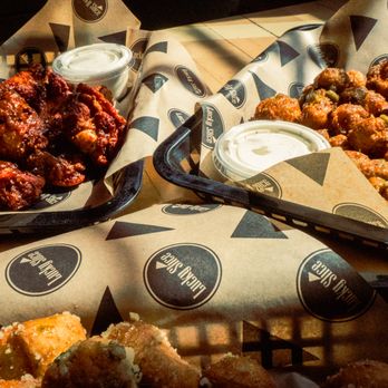 Lucky Slice Pizza - Clearfield - Wings, Cauli Buds, and Dough puppies... all tossed in your choice of wing sauce! - Pizza Near Me - Clearfield, Utah Lucky Slice Pizza - Clearfield - Wings, Cauli Buds, and Dough puppies... all tossed in your choice of wing sauce! - Pizza Near Me - Clearfield, Utah