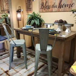 Model Home Furnishings - Lewiston - Metal stools are awesome!