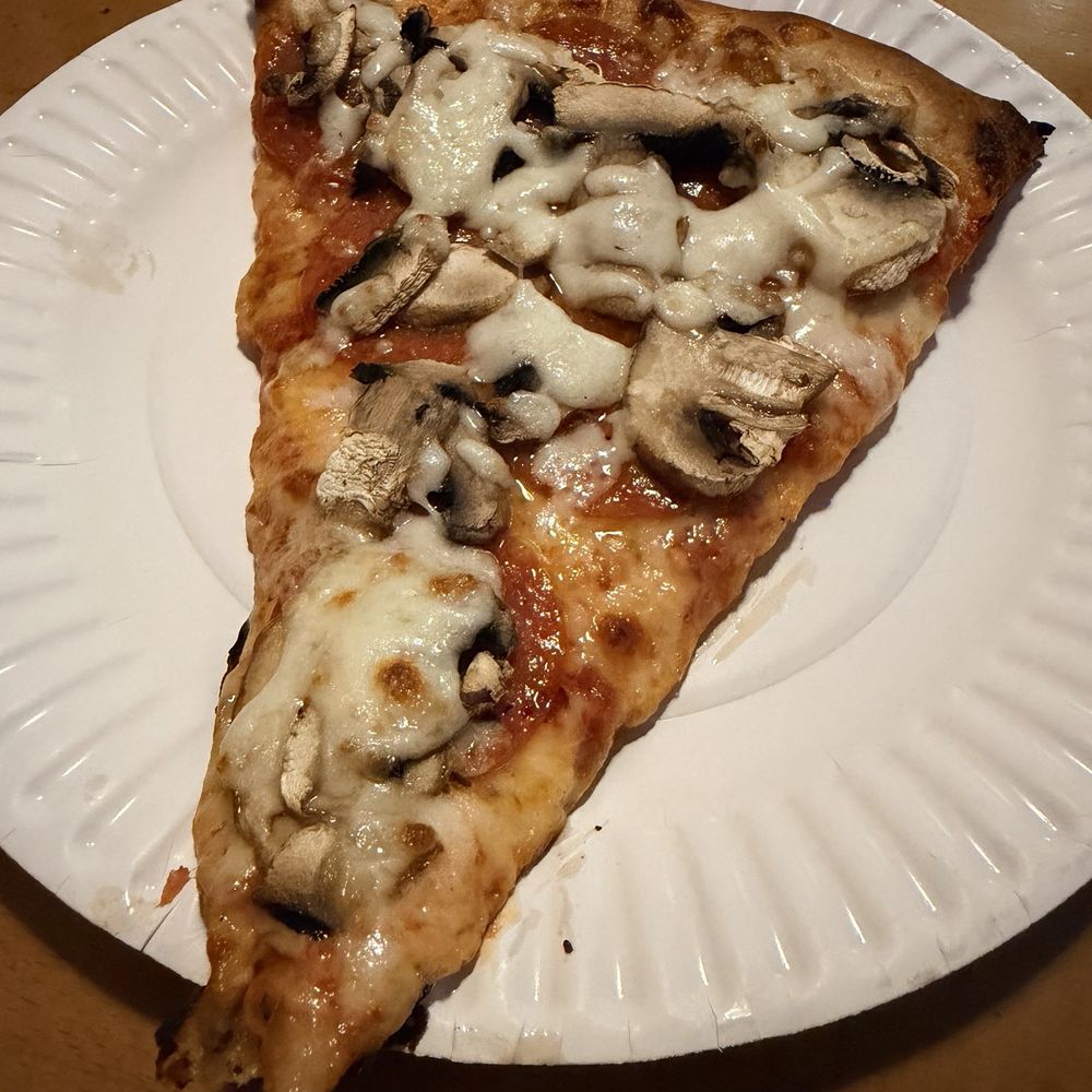 Massimos Pizza and Pasta - A slice of pepperoni and mushroom - Pizza Near Me - Costa Mesa, California Massimos Pizza and Pasta - A slice of pepperoni and mushroom - Pizza Near Me - Costa Mesa, California