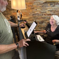 Triverde Health - Co-Founder Nancy greeting one of clients who referred his entire family (including is X wife and X MIL)