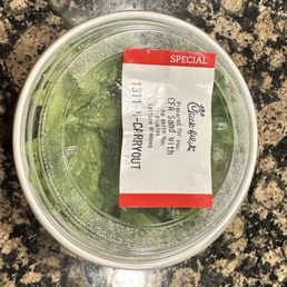 Chicken sandwich with lettuce wrap container