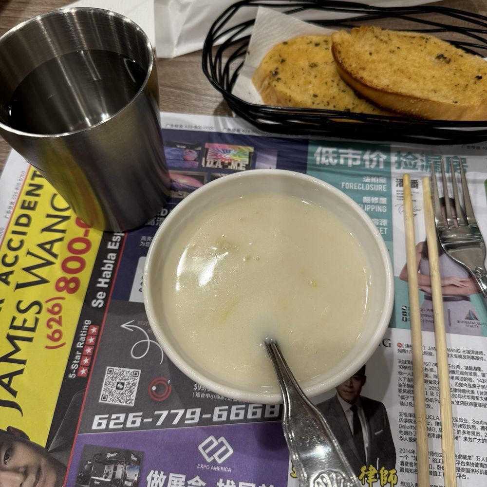 Hakka Brother - Corn soup and garlic bread before the steak, featuring James Wang - Taiwanese Near Me - Artesia, California