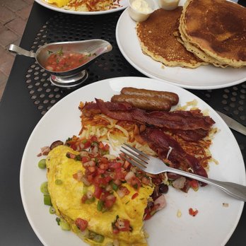 Broken Yolk Cafe - The meal for 2 is even better especially when you add pancakes but I pounded them down. - Breakfast & Brunch Near Me - Costa Mesa, California Broken Yolk Cafe - The meal for 2 is even better especially when you add pancakes but I pounded them down. - Breakfast & Brunch Near Me - Costa Mesa, California