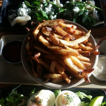 Monkeypod Kitchen - Lobster deviled eggs, fries, and pumpkin ravioli. - Hawaiian Near Me - Kapolei, Hawaii Monkeypod Kitchen - Lobster deviled eggs, fries, and pumpkin ravioli. - Hawaiian Near Me - Kapolei, Hawaii