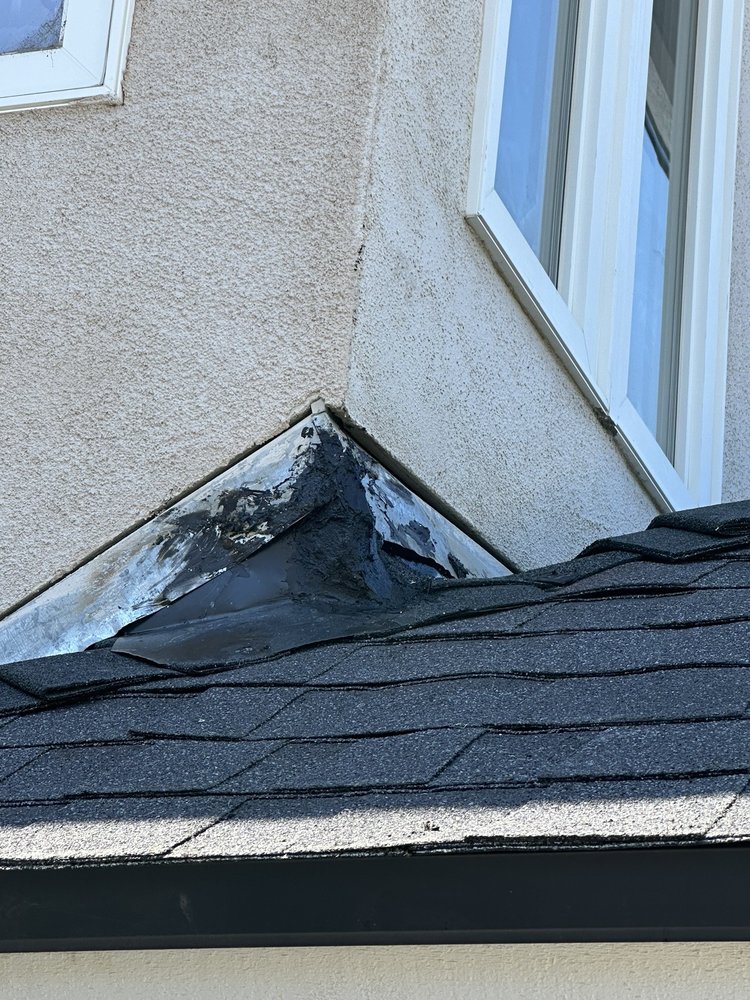 Slide of RH Roofing
