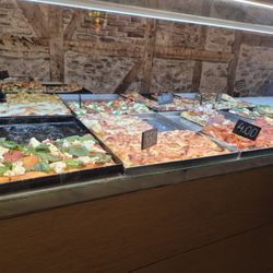 Pizzeria Romana Al Taglio - Pizza for sale by the slice - some of the flavors that day, more close up