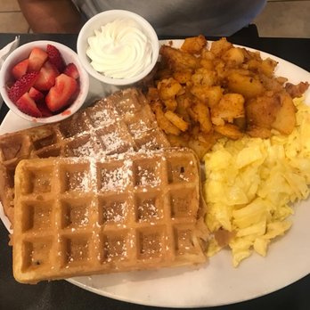 Maple Leaf Diner - Scrambled eggs, skillet potatoes, & waffles with strawberries and whipped cream - American Near Me - Dallas, Texas Maple Leaf Diner - Scrambled eggs, skillet potatoes, & waffles with strawberries and whipped cream - American Near Me - Dallas, Texas