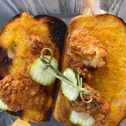 Nashville Hot Chicken Shack - Tiny, soggy, broken... chicken strips, on burnt toast...