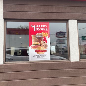 Arby's - a happy hours sign in the window - Fast Food Near Me - Winter Haven, Florida Arby's - a happy hours sign in the window - Fast Food Near Me - Winter Haven, Florida