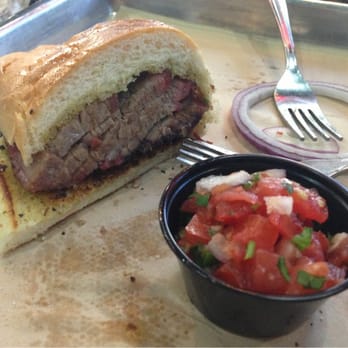Armadillo Willy's BBQ - Santa Maria tri-tip steak sandwich (half) with salsa and red onions. - Barbeque Near Me - Dublin, California Armadillo Willy's BBQ - Santa Maria tri-tip steak sandwich (half) with salsa and red onions. - Barbeque Near Me - Dublin, California