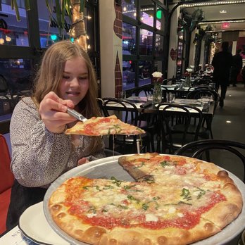 Nittis Italian Restaurant in Hell's Kitchen - Margherita pizza - Italian Near Me - New York, New York Nittis Italian Restaurant in Hell's Kitchen - Margherita pizza - Italian Near Me - New York, New York