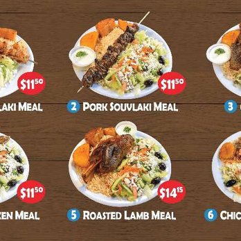 Greek Stop - six plates of food on a wooden table - Greek Near Me - Aurora, Ontario Greek Stop - six plates of food on a wooden table - Greek Near Me - Aurora, Ontario