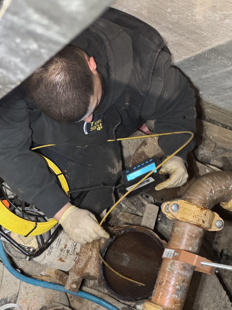 Slide of Tommy Sewers