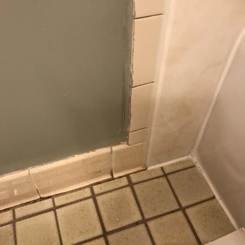 The Tiki - Bathroom crusty painted over grout - Resorts Near Me - Lake George, New York