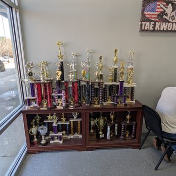 World Champion Tae Kwon Do - This is a view of the Trophy Table. Photo taken March 7, 2026. - Taekwondo Near Me - Virginia Beach, Virginia World Champion Tae Kwon Do - This is a view of the Trophy Table. Photo taken March 7, 2026. - Taekwondo Near Me - Virginia Beach, Virginia