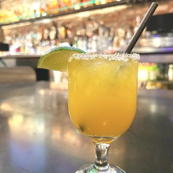 Brick & Beam - Mango Margarita. This tropical & refreshing cocktail combines the sweet, juicy flavor of mangoes with the smooth bite of tequila. - Sports Bars Near Me - San Francisco, California