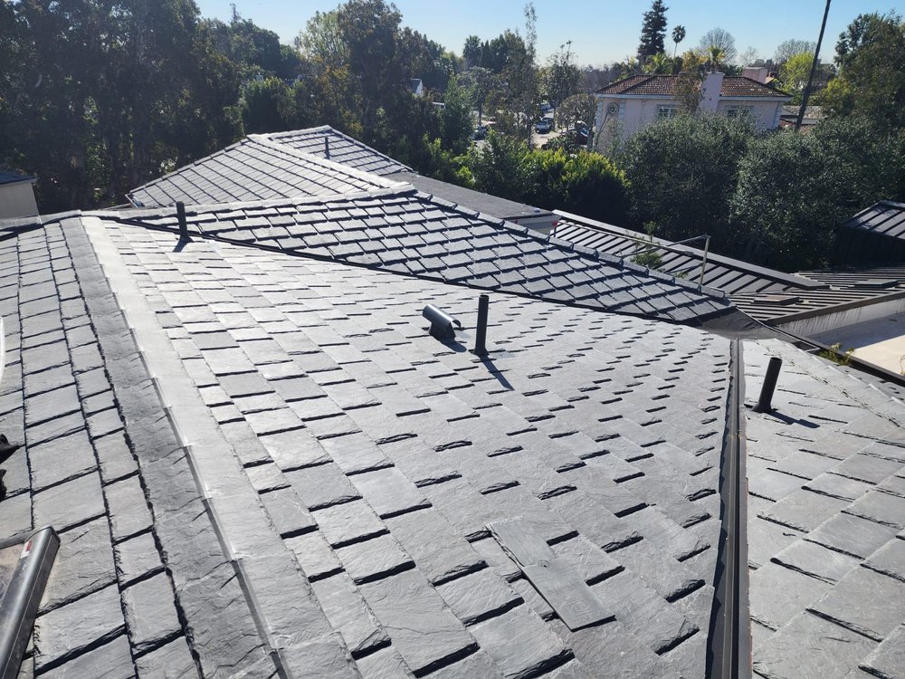 Slide of SLR Roofing