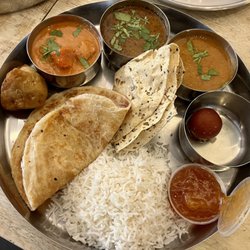 Tifinbox - Veg Thali: butter paneer, dal makhani, chana masala, samosa, rice, paratha, papad, mango chutney, gulab jamun