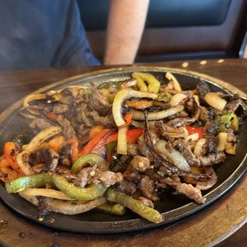 Los Cuates Mexican Restaurant - Fajitas. Meat was cut too small and got very dry during cooking. - Mexican Near Me - Flowery Branch, Georgia Los Cuates Mexican Restaurant - Fajitas. Meat was cut too small and got very dry during cooking. - Mexican Near Me - Flowery Branch, Georgia