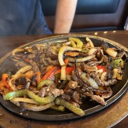 Los Cuates Mexican Restaurant - Fajitas. Meat was cut too small and got very dry during cooking.