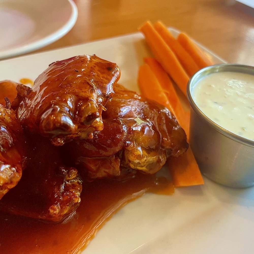 Tribeca Tavern - Sriracha Honey Wing Appetizer. The sauce was - American Near Me - Cary, North Carolina