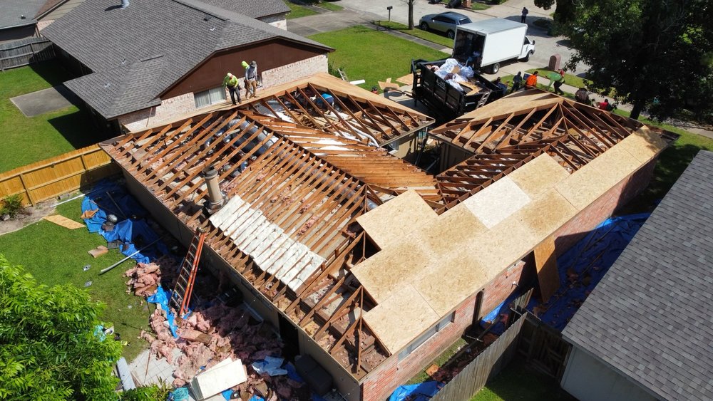 Slide of Space City Roofing & Remodeling