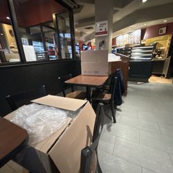 Boxes with the plates they serve people with.