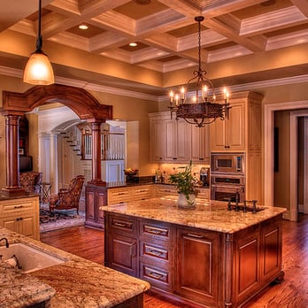 Tomlinson Builders - a large kitchen with a center island - General Contractors Near Me Tomlinson Builders - a large kitchen with a center island - General Contractors Near Me