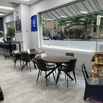 Bubbles & Suds Laundromat - Sitting area with tables and chairs - Laundromat Near Me - Brooklyn, New York Bubbles & Suds Laundromat - Sitting area with tables and chairs - Laundromat Near Me - Brooklyn, New York
