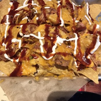 Twin Peaks - Pulled pork nachos - Sports Bars Near Me - Madison Heights, Michigan Twin Peaks - Pulled pork nachos - Sports Bars Near Me - Madison Heights, Michigan