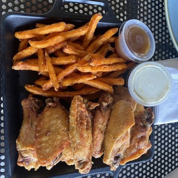Front Porch - Lemon pepper Fried chicken wings with sweet potato fries. Caramel drizzle. - Bars Near Me - Hoover, Alabama Front Porch - Lemon pepper Fried chicken wings with sweet potato fries. Caramel drizzle. - Bars Near Me - Hoover, Alabama