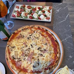 Ristorante Domino - Bufala Caprese salad and ham and mushroom pizza
