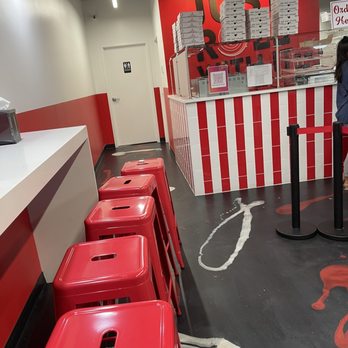 Sweet Charlie's - a woman sitting at a counter - Ice Cream & Frozen Yogurt Near Me - Wilmington, Delaware Sweet Charlie's - a woman sitting at a counter - Ice Cream & Frozen Yogurt Near Me - Wilmington, Delaware