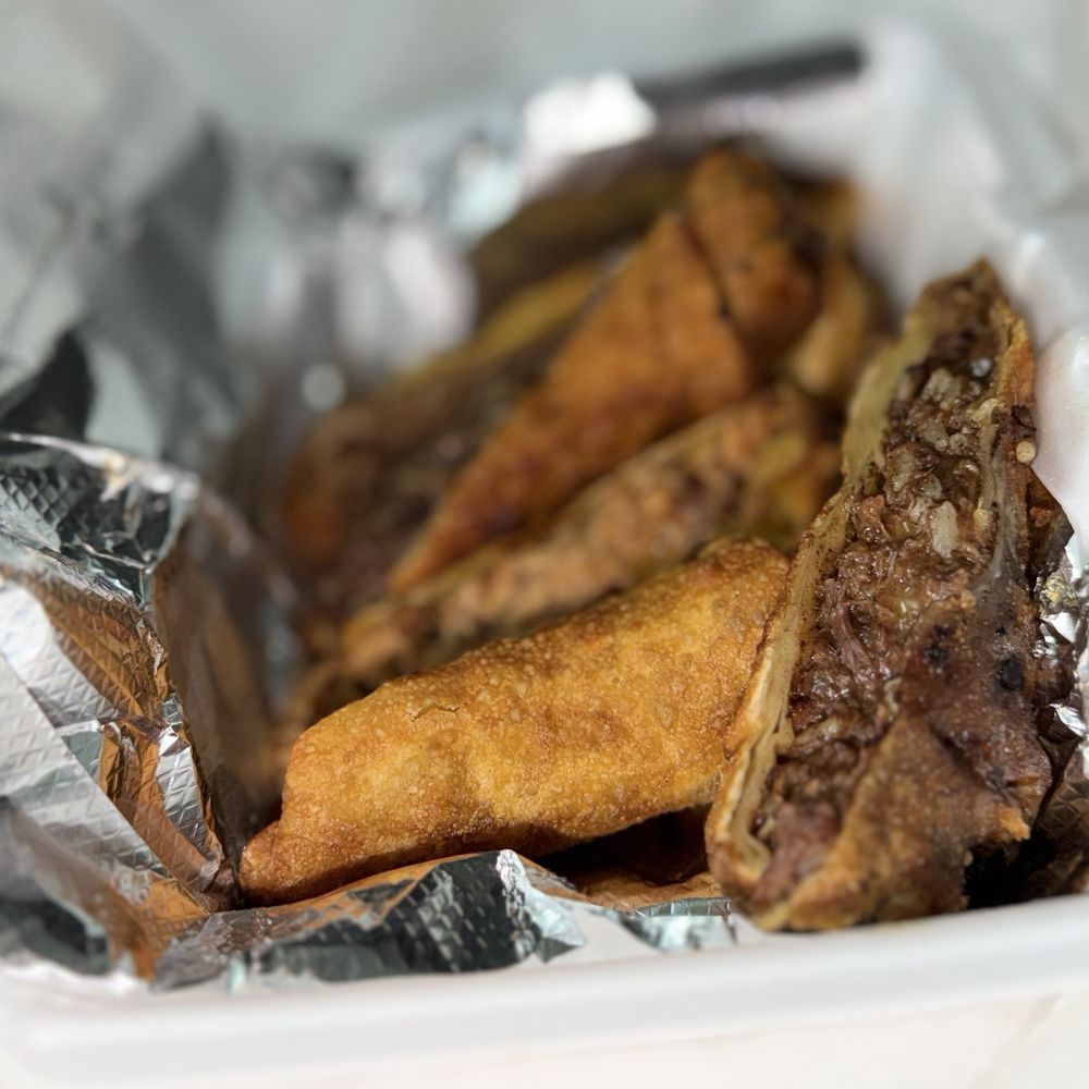 Caribbean Jerk Palace - Trio jerk rolls... salmon, oxtail & shrimp. - Caribbean Near Me - Houston, Texas Caribbean Jerk Palace - Trio jerk rolls... salmon, oxtail & shrimp. - Caribbean Near Me - Houston, Texas